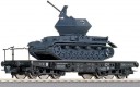 66901 Roco Heavy duty Flat car type SSy Köln loaded with Ostwind tank